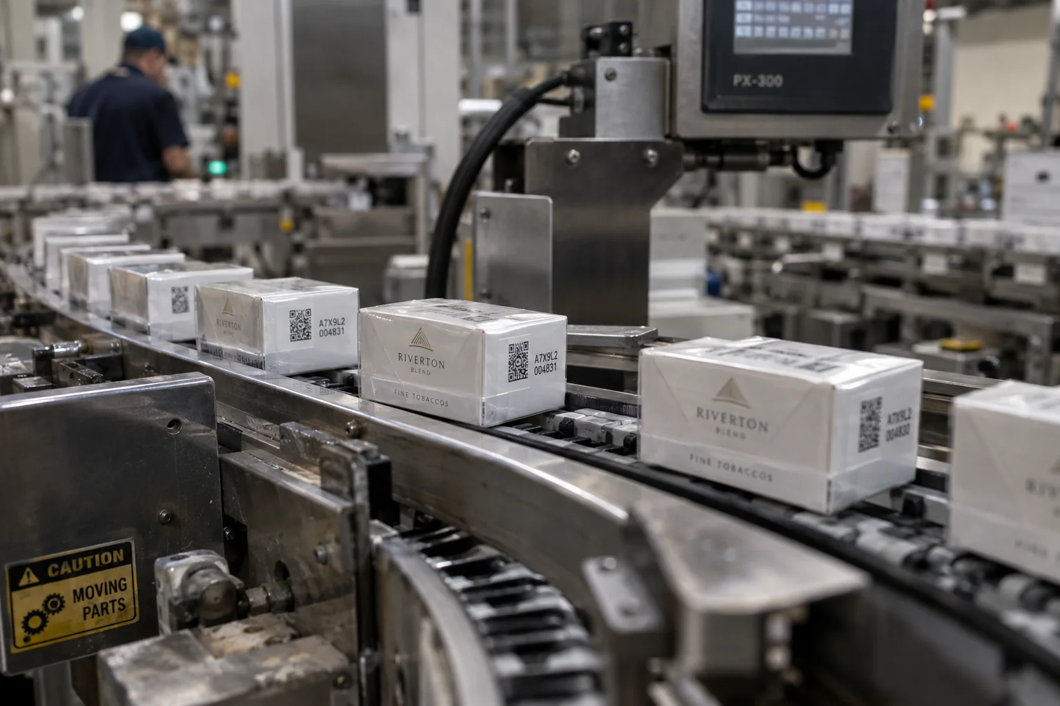 Cigarette cartons and packs with printed unique identifiers on a high-speed packaging line