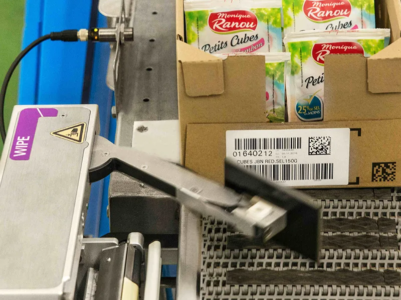 GS1 2D code with batch and date on a bottle multipack and a cardboard case, secondary packaging